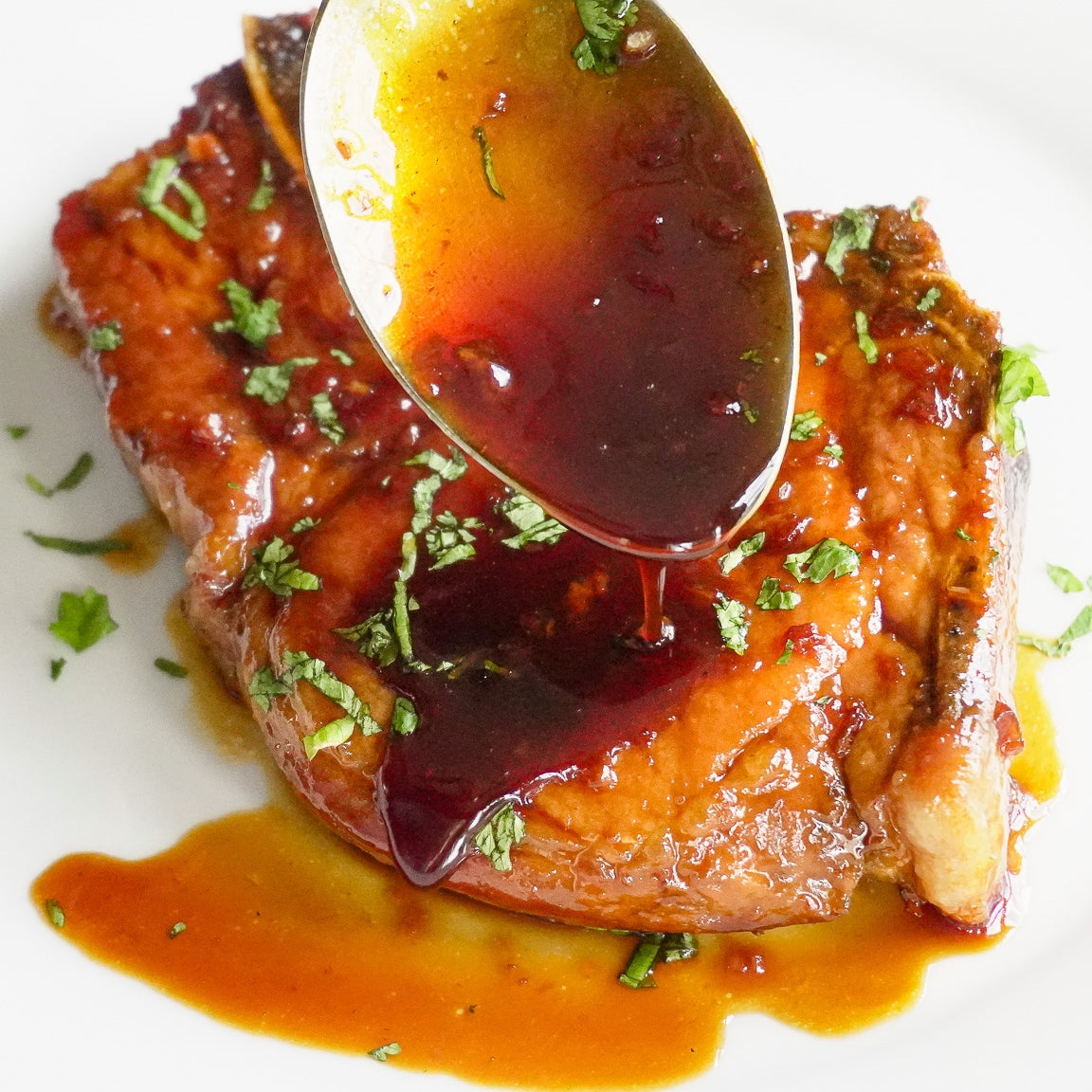 files/garlic-honey-pork-chops-with-spoon.jpg