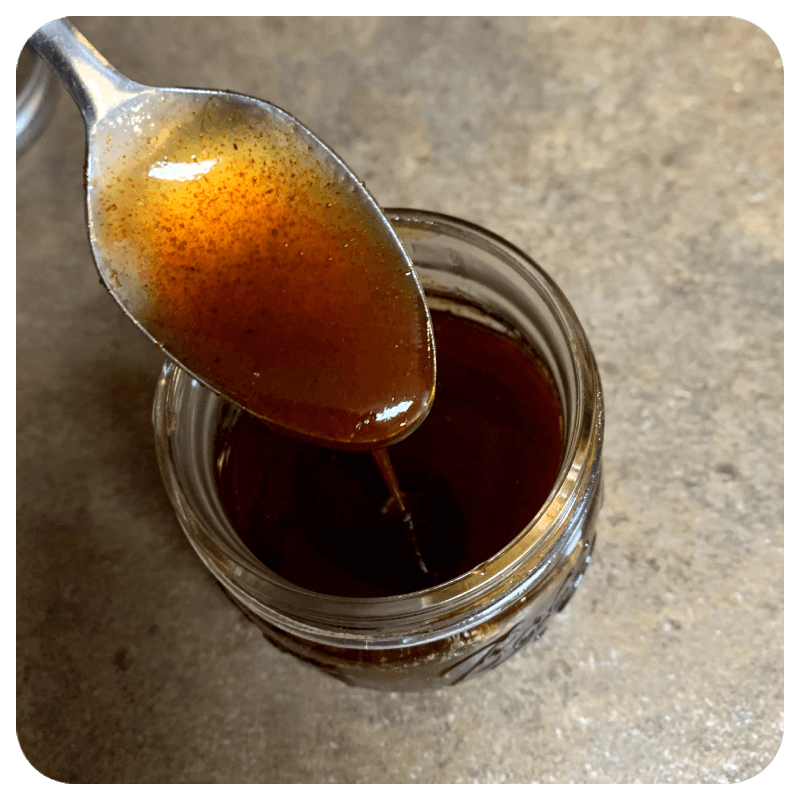 Honey Chipotle Sauce in a small mason jar
