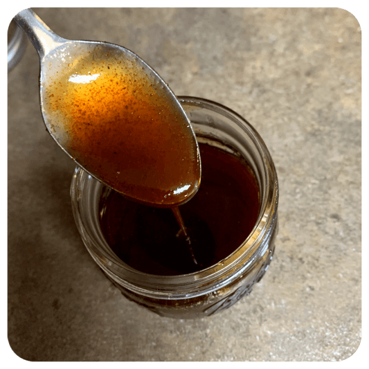 Honey Chipotle Sauce in a small mason jar