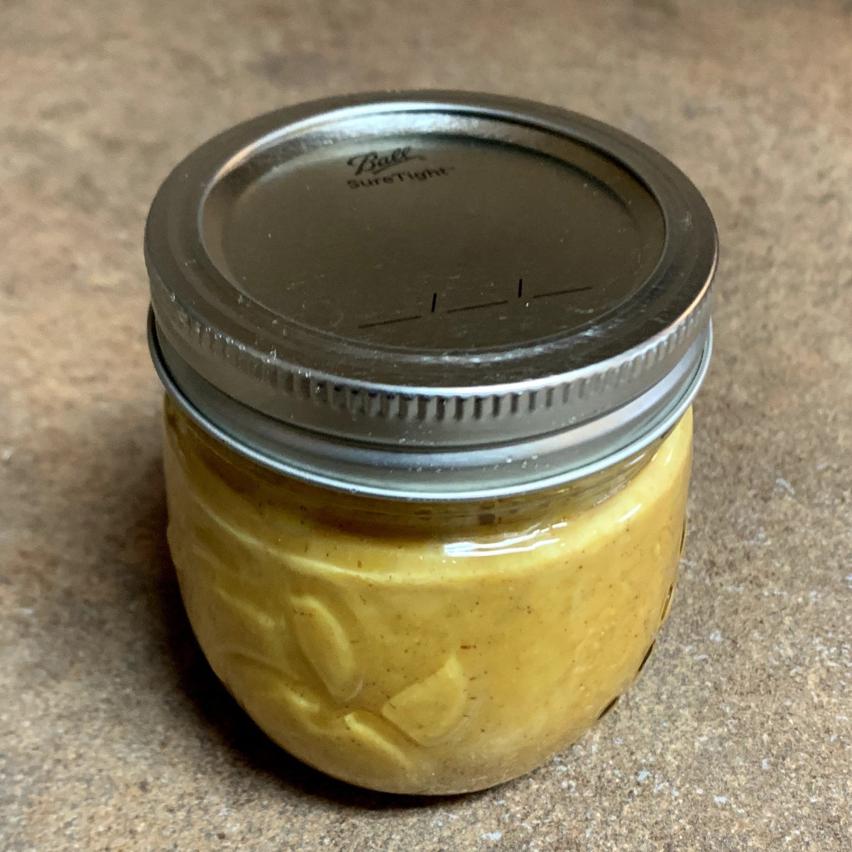 Honey Gold Sauce in a tightened container.
