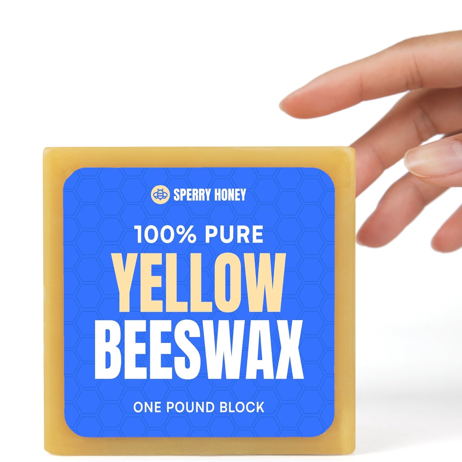 Block of 100% pure yellow beeswax with Sperry Honey branding on a white background