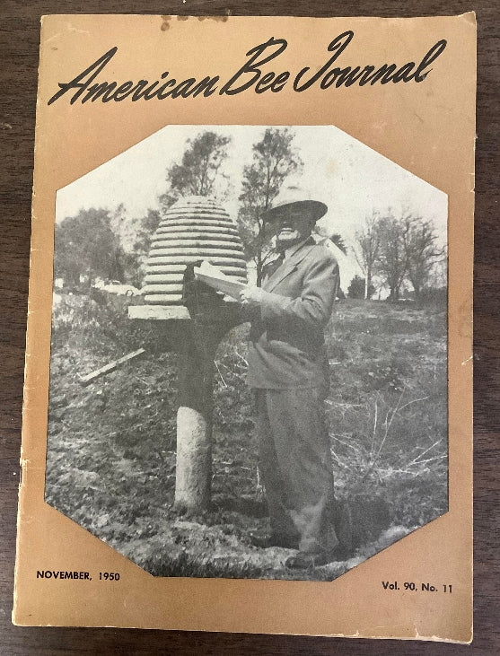 Cover of 'American Bee Journal' from November 1950 featuring Everett Sperry with a beehive.