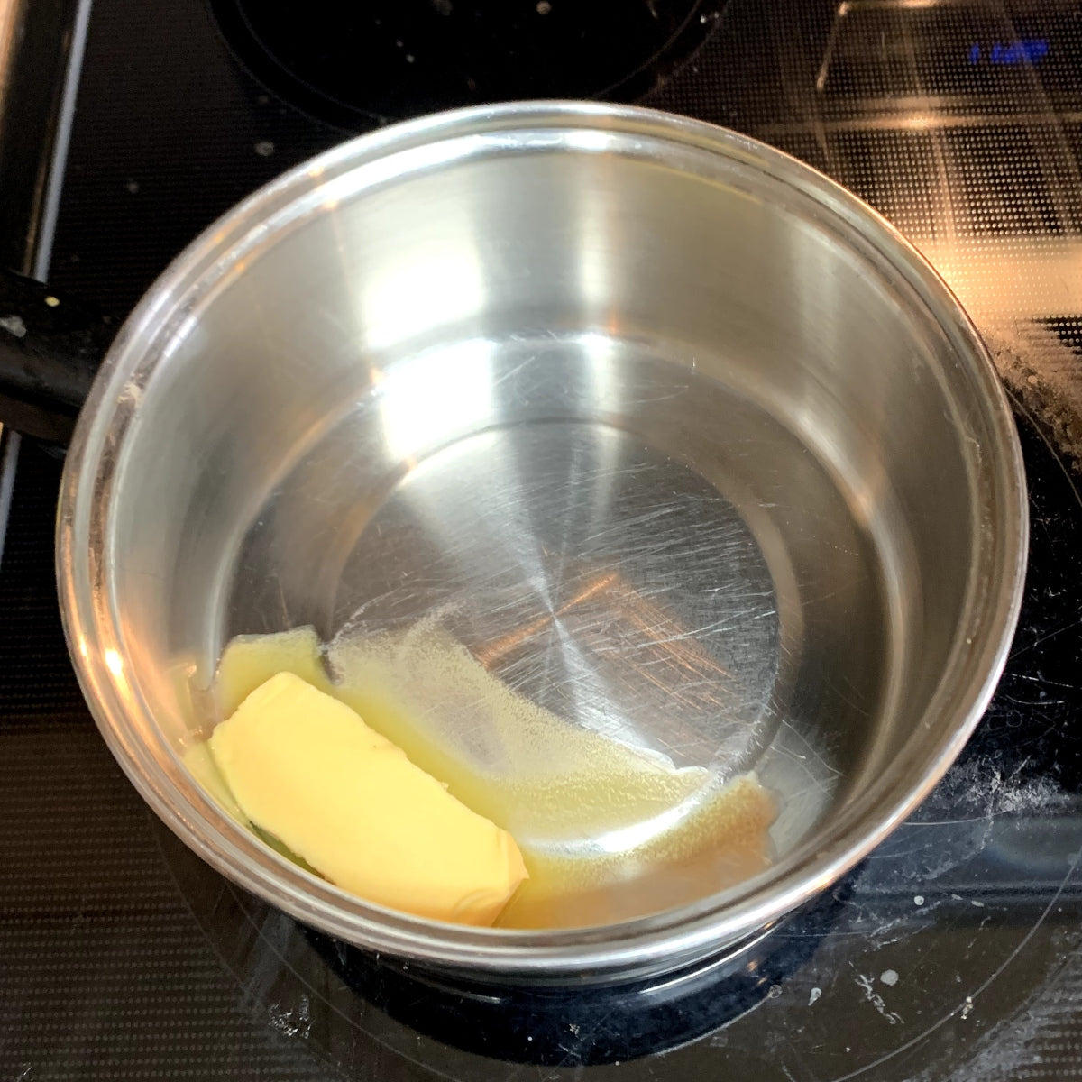 Butter melting in a saucepan.