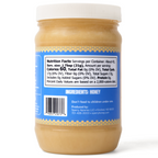 Jar of honey with a blue label showing nutrition facts and ingredients.