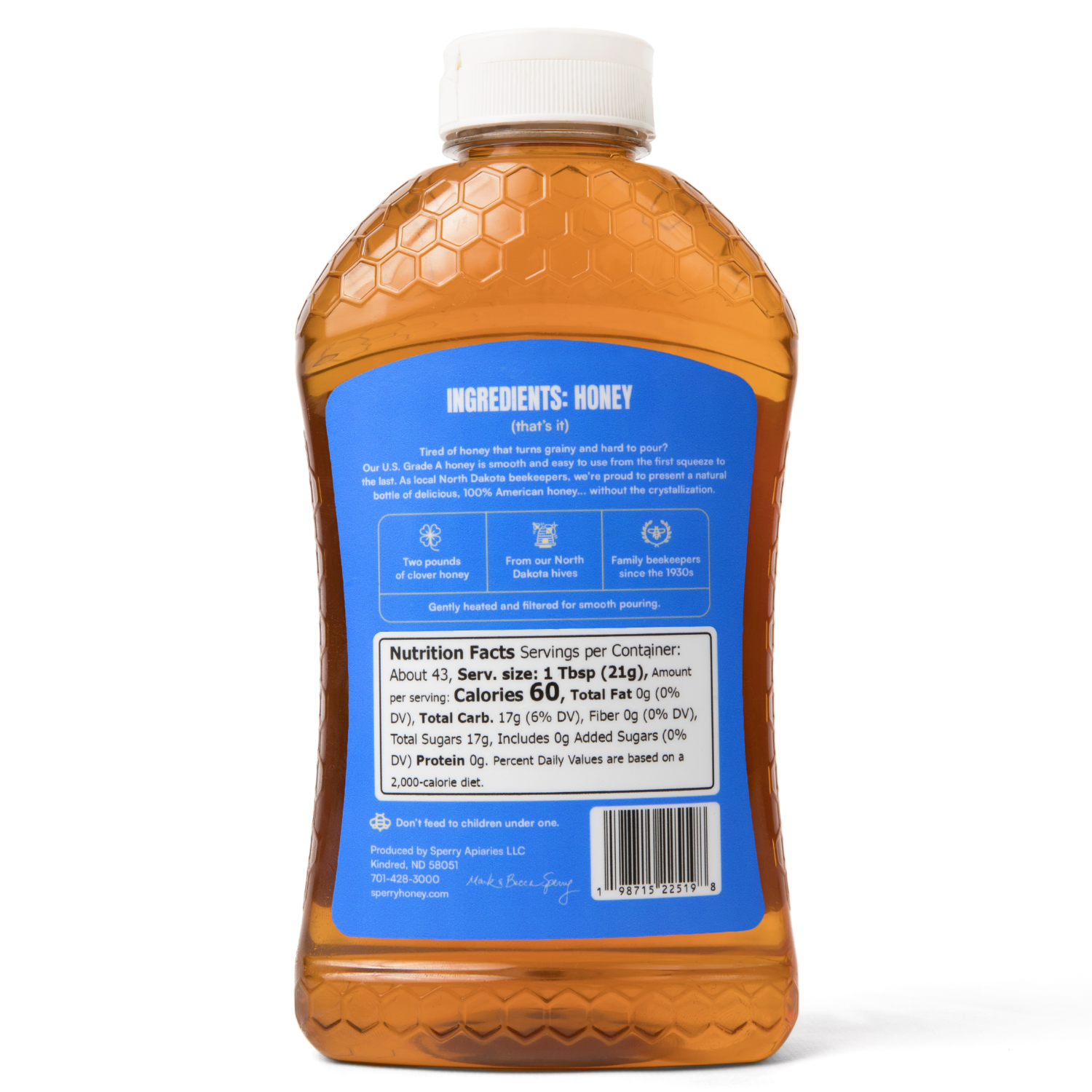 Bottle of honey with a blue label on a white background