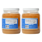 Two large jars of Raw & Unfiltered Honey with white lids and blue labels, shown side by side, facing backwards, on a white background.