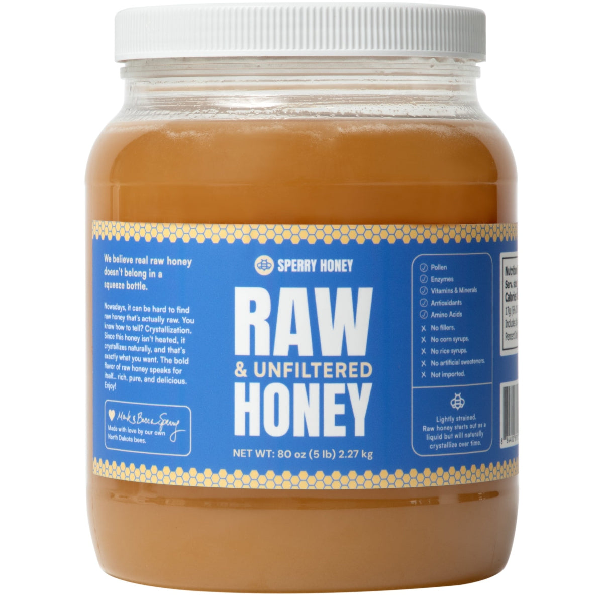 Jar of 5 lb raw and unfiltered honey on a white background