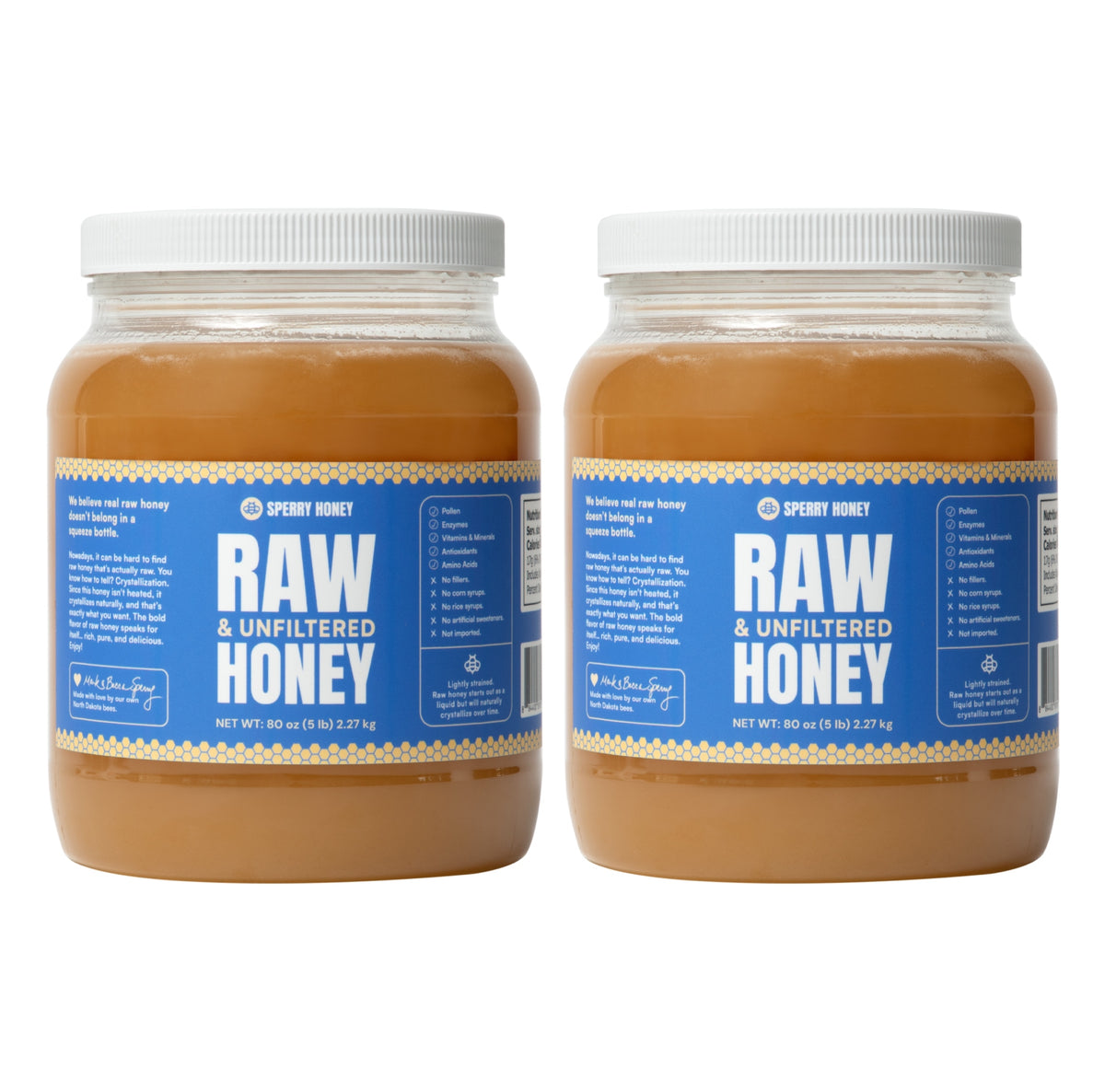 Two large jars of Raw & Unfiltered Honey with white lids and blue labels, shown side by side on a white background.